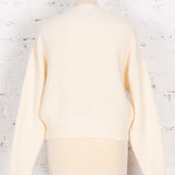 Pulover cu model floral April crem